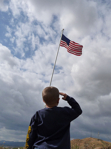 Child Saluting American Flag, by respres on Flickr
